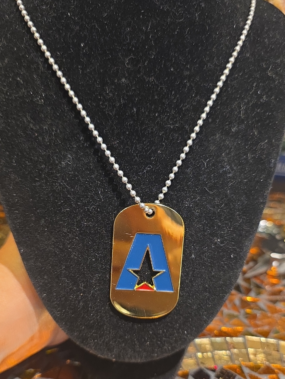 Gold Tone Dog Tag Necklace with Blue Star Accent